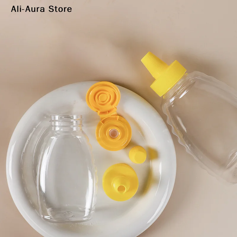 Transparent Reusable Plastic Honey Bottles Squeeze Honey Bottle Container Holder With Lid For Storing And Dispensing Honey Jar