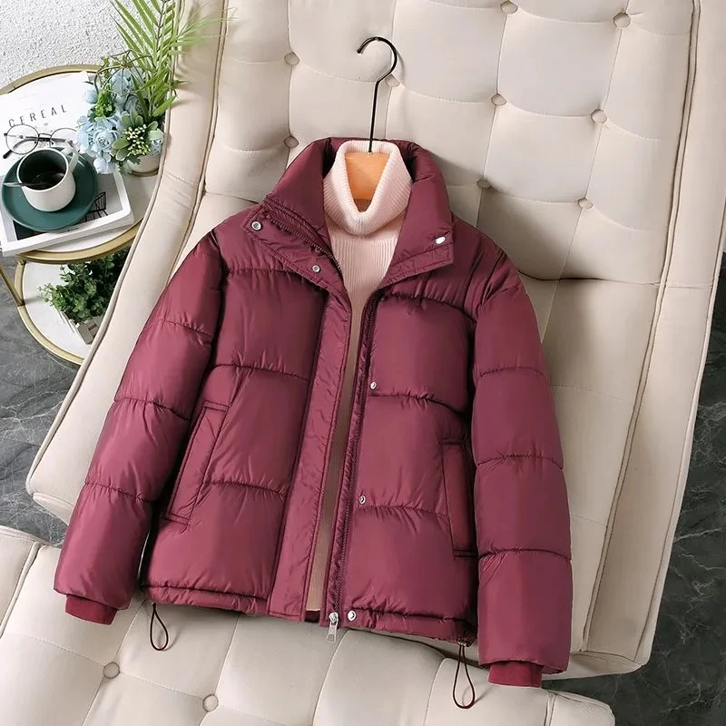 Abrigo de plumón de algodón para mujer, chaqueta ligera y cálida, acolchada, holgada, informal, color negro y Beige, novedad de invierno, 2024