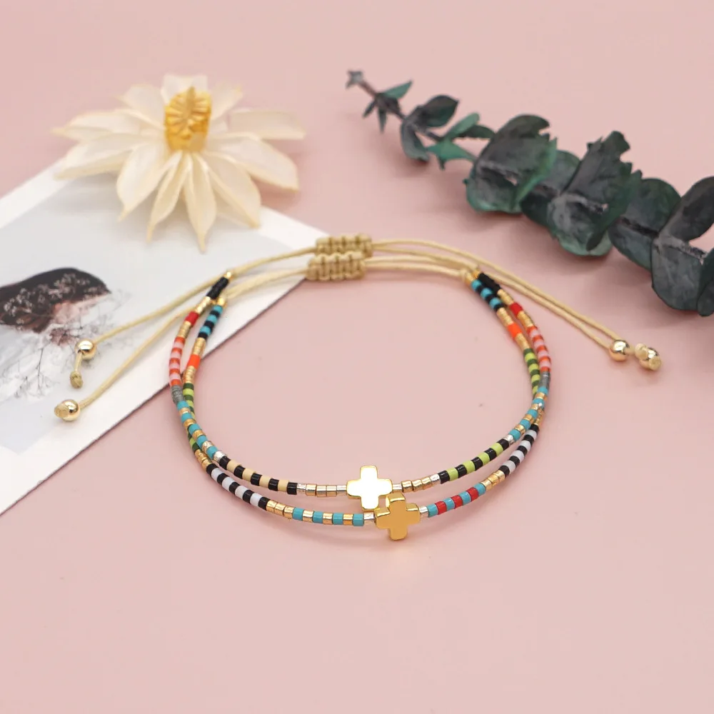 Nowa transgraniczna minimalistyczna bransoletka damska w stylu bohemy Rainbow Rice Beads Handmade Beaded Cross Wszechstronna warstwowa bransoletka damska