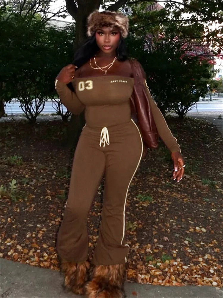 

Спортивный комплект Nibber из 2 предметов: женский укороченный топ с вырезом-лодочкой и буквенным принтом + брюки с завязками и полосатым декором, повседневный уличный костюм