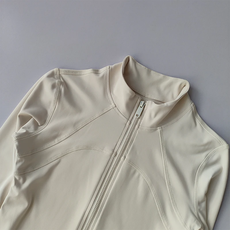 Veste de sport à col montant et manches longues pour femme, haut de yoga haut de gamme, idéal pour la course, l'entraînement et le fitness, combinaison de course coupe-vent.