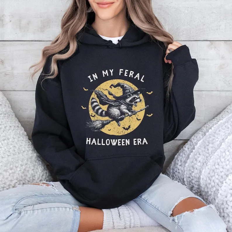 

Raccoon Halloween Hoodie Sweatshirt Funny Racoon Moon Crewneck In My Feral Halloween Era Raccoon Pullover Retro Halloween Feelin