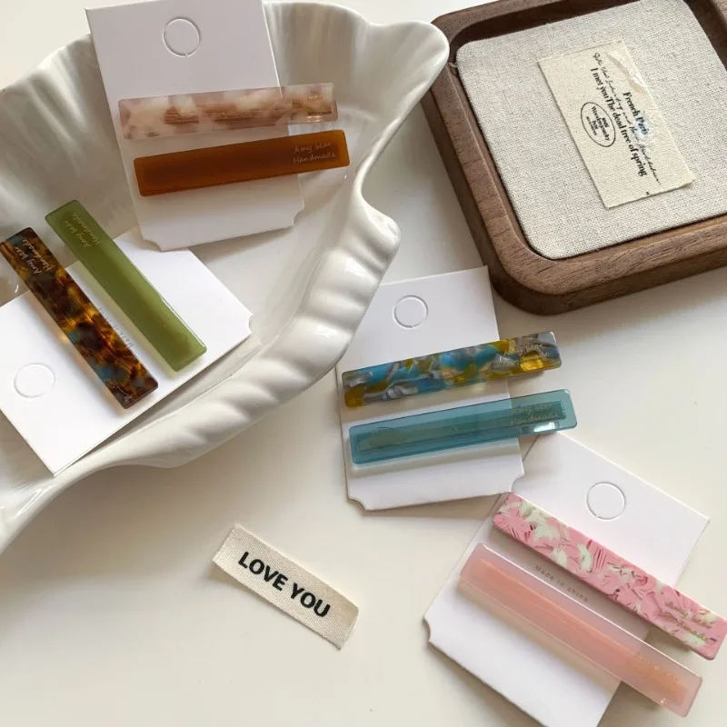 Stile straniero semplice 2 clip copricapo forcina da donna 2025 nuovo temperamento di fascia alta Clip per banconote d'anatra laterale in acido acetico coreano