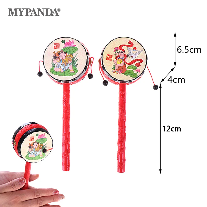 

1Pc Chinese traditional spin toy rattle drum kids cartoon hand bell for baby