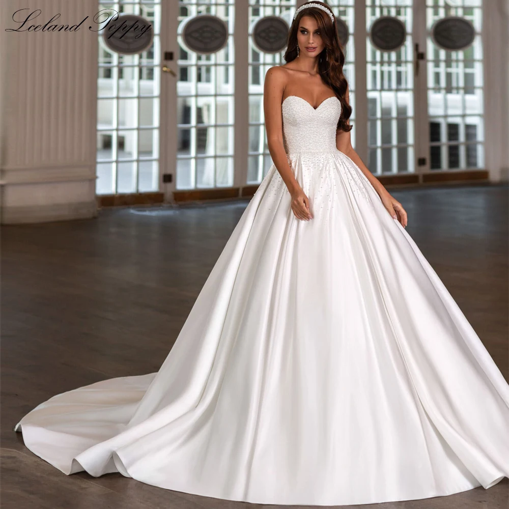 Lceland Poppy Customized A Line Strapless Satin Wedding Dresses Sleeveless Princess Pearls Beaded Bridal Gowns with Court Train