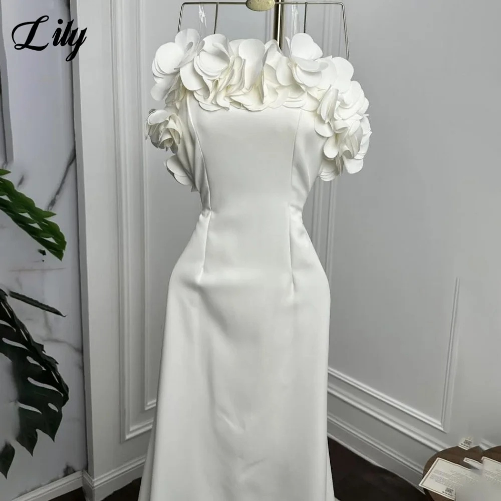 

Белое вечернее платье без бретелек Вечернее платье из атласных складков فساتين السهرة с цветами Раструбное гала-платье по индивидуальному заказу