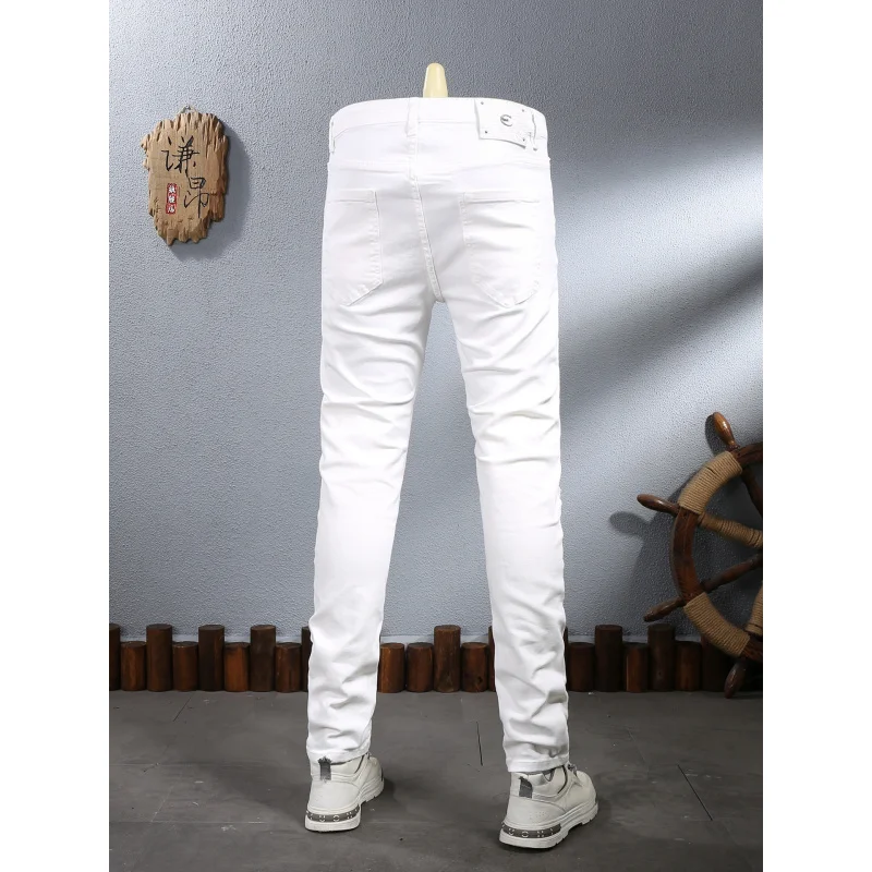 

White trendy stretch slim fit ripped patch small straight casual denim pants men's American street style denim pants