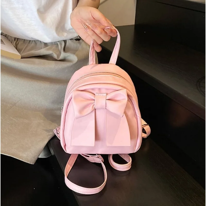 귀여운 리본 백팩 여성 패션 소형 숄더백 심플한 디자인 캐주얼 다용도 여행 팩(핑크)