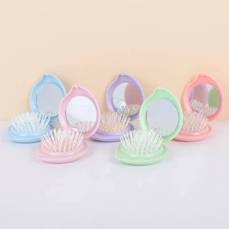 

10PCS Peach shaped mirror comb, colorful air cushion massage, compact and portable travel pocket folding comb