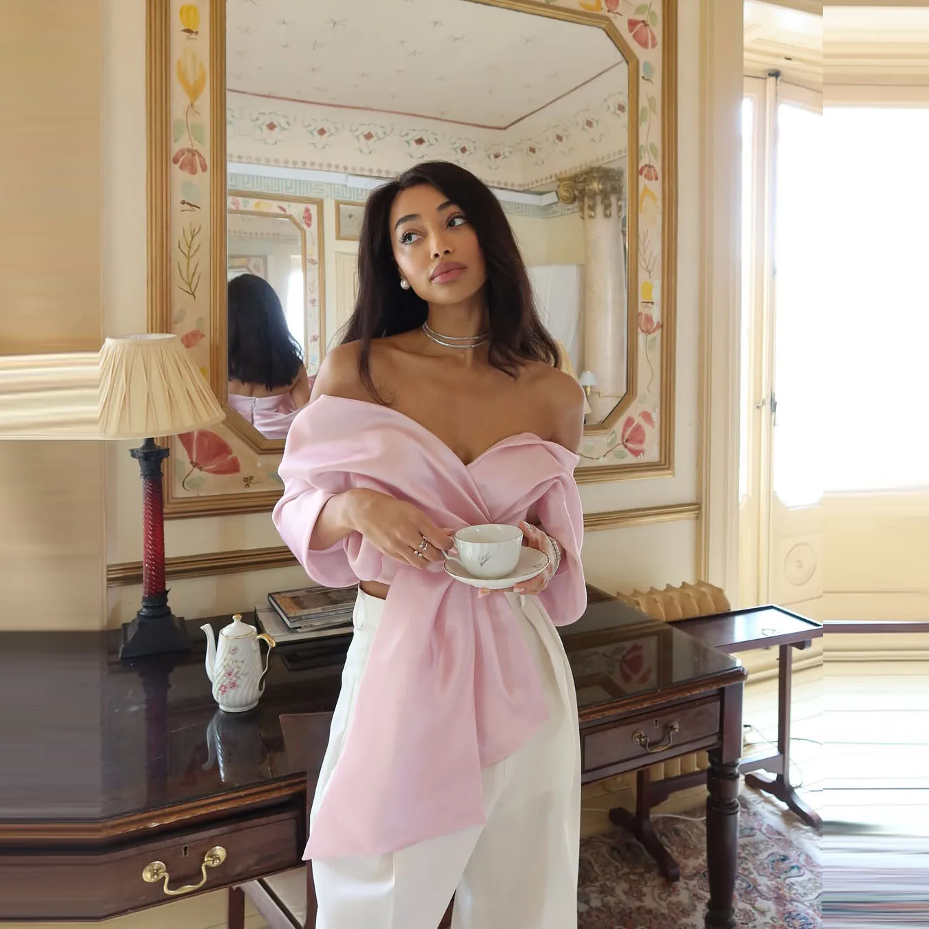 

Pink Satin Off Shoulder Blouse with Wide Sleeve Design and White Wide Leg Pants Set Fashionable and Comfortable for Party Wear