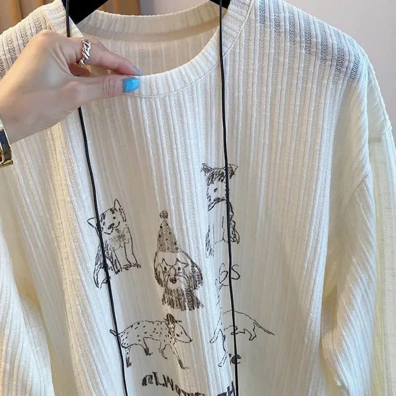 T-shirt con scollo a O Estetica oversize Design cartoon Top eleganti Vintage Casual stile americano Manica lunga Autunno Abbigliamento donna