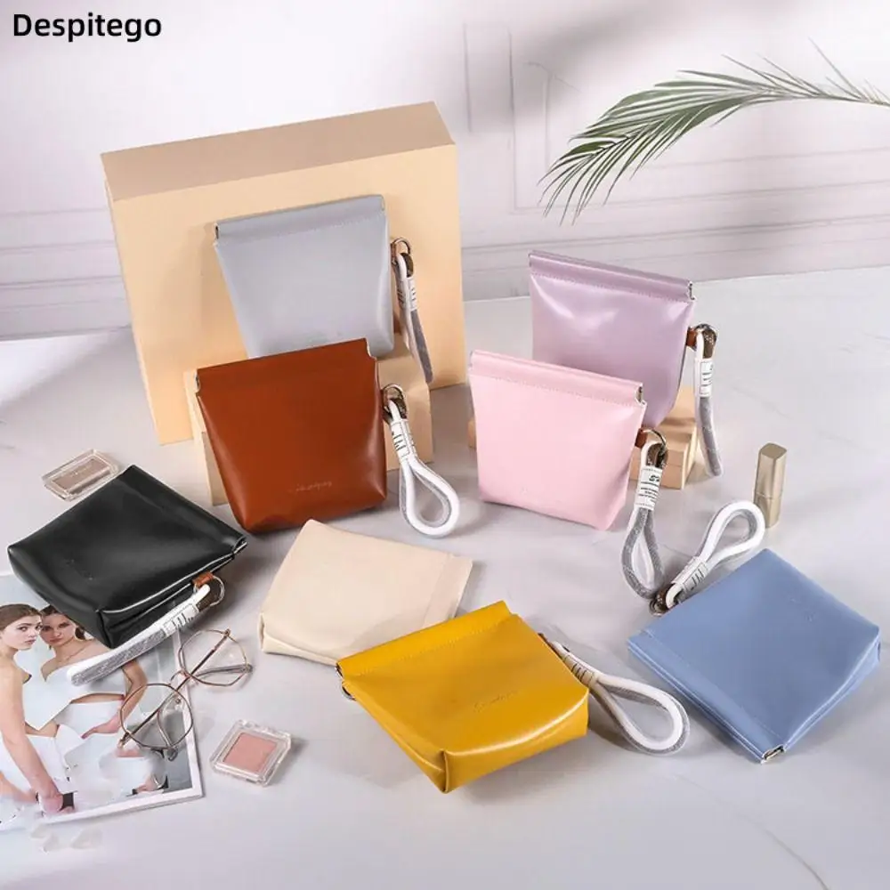 

Portable PU Self-closing Cosmetic Bag Creative Data Cable Storage Bag Sanitary Napkin Storage Bag