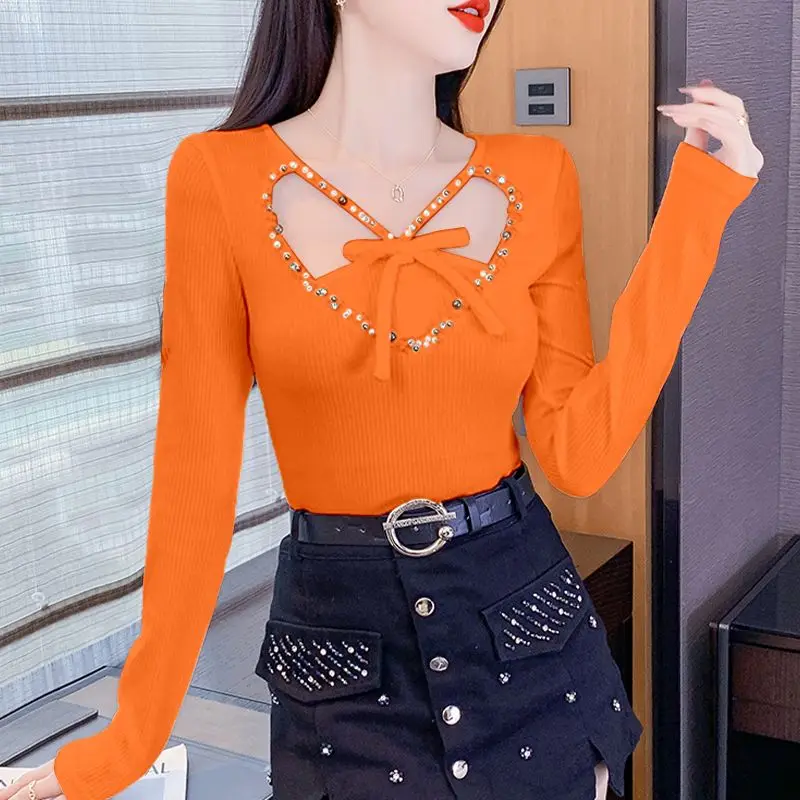 

Новинка осени 2024, женская нижняя рубашка, модные лоскутные вязаные пуловеры с v-образным вырезом, женская одежда, офисные женские ажурные футболки