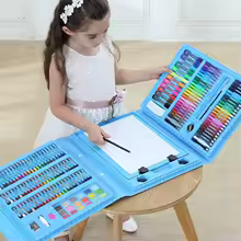Complete set laid out with all pieces including pens, pencils, pastels, and accessories