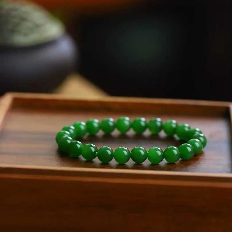

Natural Hotan Jade Russian Material Jadeite with Light Green's Eye Effect, Round Smooth Bead Bracelet
