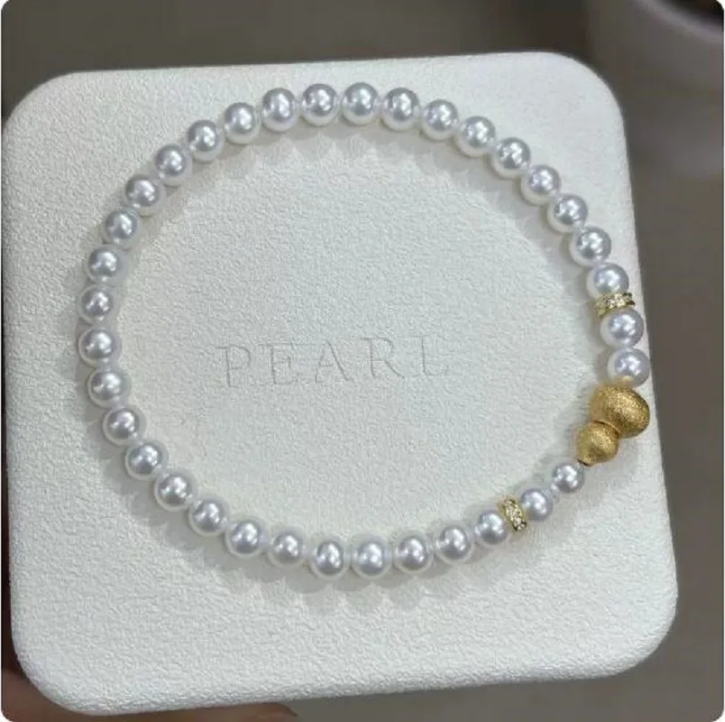 

gorgeous 5-6mm south sea white pearl bracelet 925s 7.5-8''