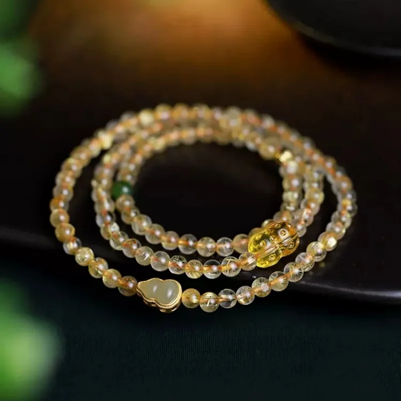 

Натуральный браслет женский бразильский золотисто-желтый рутилированный кварцевый камень тыква