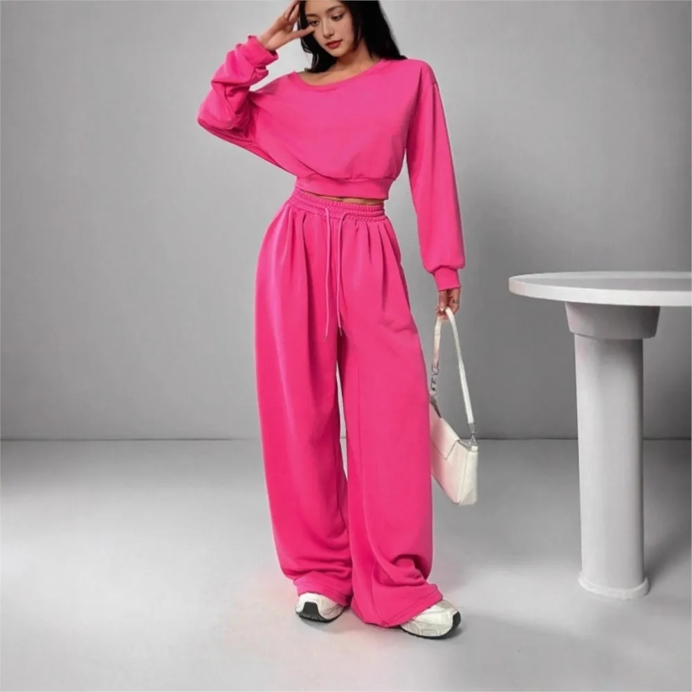 

Весенний новый модный комплект: спортивные брюки с эластичным поясом и завязками, свободного кроя, и повседневный свитшот с одним рукавом и длинным рукавом, женский костюм из двух предметов.