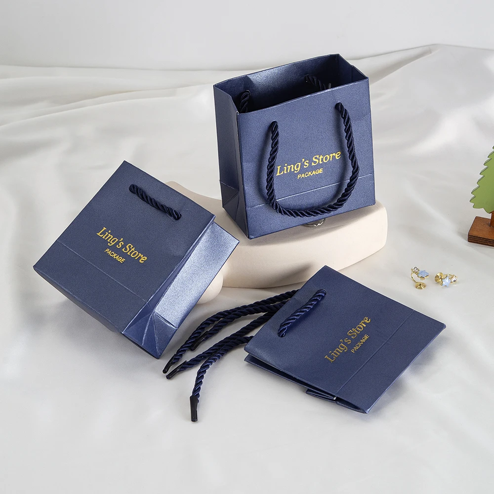 

20/50/100Pcs Personalized Logo Jewelry Paper Handle Tote Bag 10x5x10cm 11x6x12cm 13x7x16cm Shopping Handbag Gift Organizer Pouch