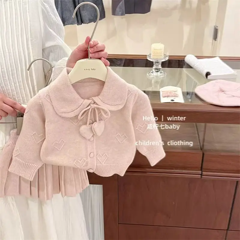 

Korean Version Of Girls' 2026 Spring And Autumn New Pink Knitted Suit Little Girl's Love Doll Collar Dweater Pleated Half Skirt