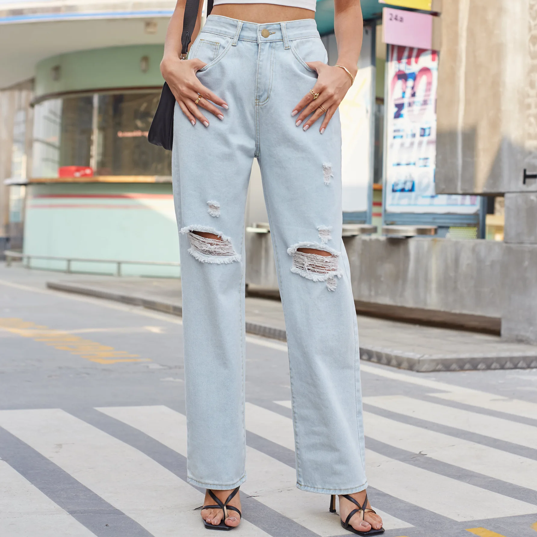 

European and American fashion women's new washed light retro casual hole denim trousers women's clothing