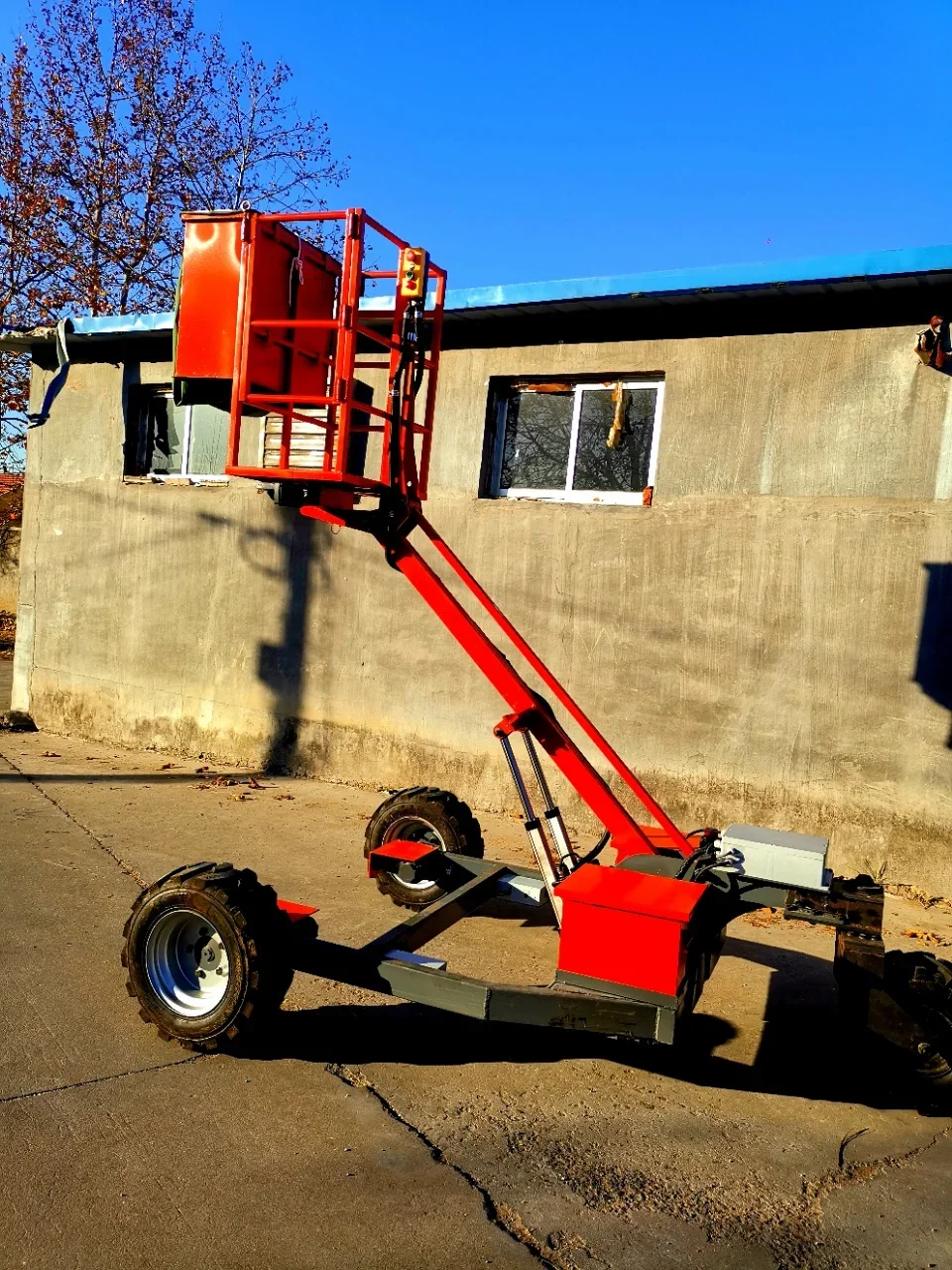 Fabriek directe verkoop sleepbaar boomgaard hefplatform mobiele lift sleepbare kersenplukker Aerial Working Boom Lift