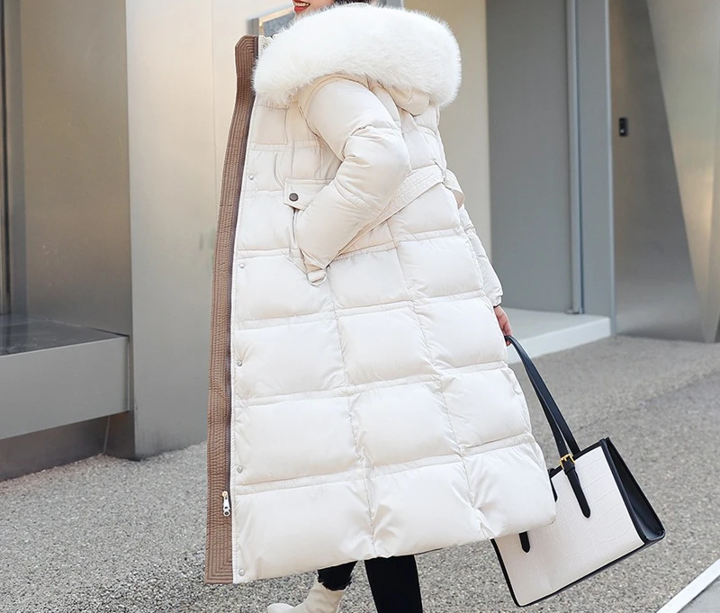 

2025 Winter New Cotton Jacket Women's Extended Version Over Knee Big Hairy Collar Slim Belt Hooded Cotton Jacket