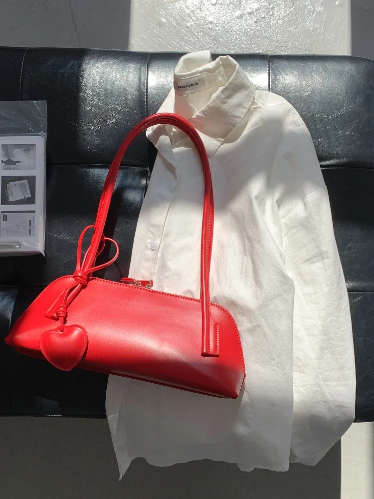 تنوعا الرجعية الكورية نمط القلب الرغيف الفرنسي حقائب اليد للنساء بلون بولي Leather حقائب جلدية تحت الإبط بسيطة التنقل عادية حمل