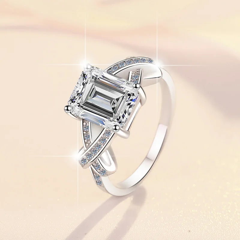 Warm anniversary inlay adorns intertwined ribbon ring for women with fine 2ct moissanite over refined PT950 platinum ingots