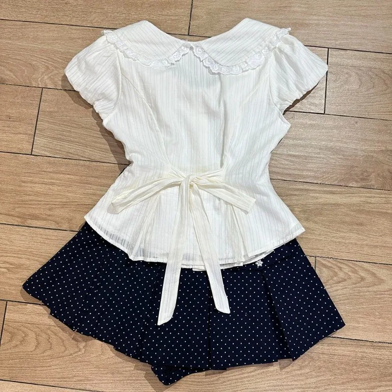 A New French Fashion Pure and Sweet Girl Set, Featuring A Doll Collar Shirt and A Summer Super Ethereal Polka Dot Pleated Skirt.