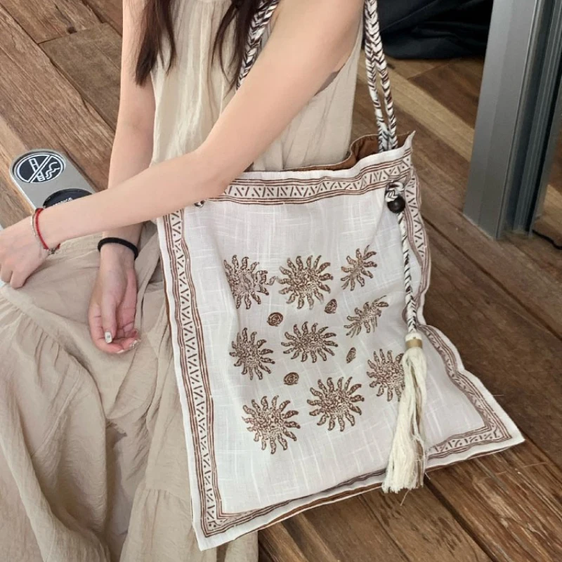 Designer Style Bohemian Linen Bag With Braided Handle Ethnic Floral Embroidered Tote Bag Women Crossbody Shopper Bag With Tassel view 3