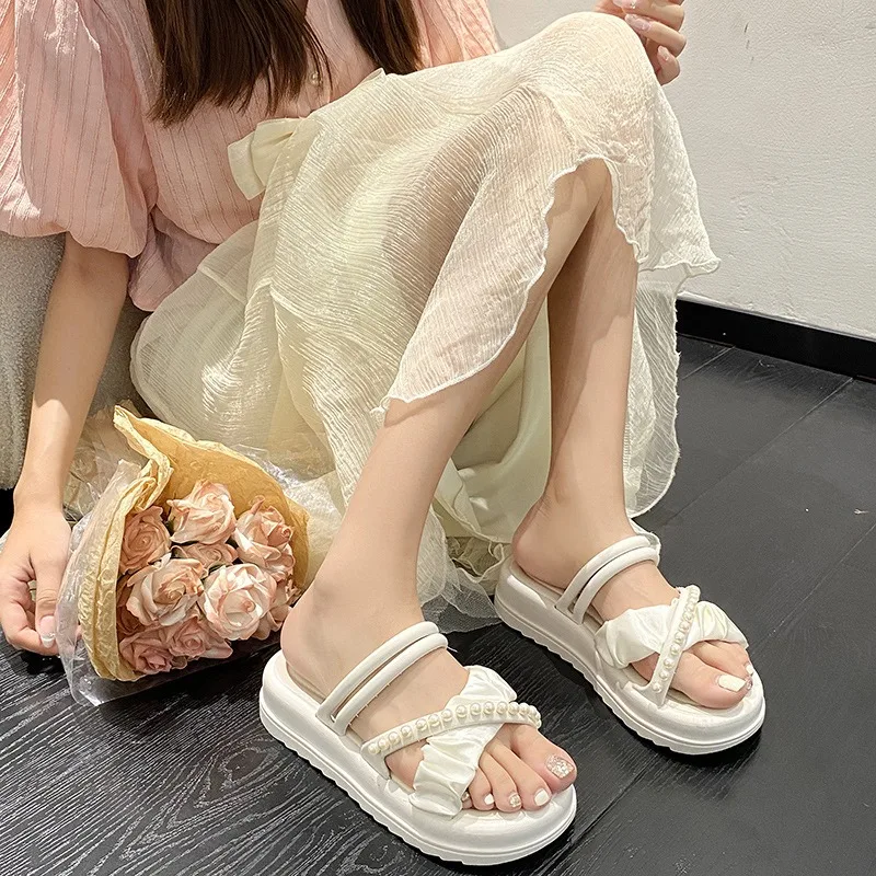 New Slippers Women\'s Summer Fairy Style Outer Wear Fashion Internet Celebrity Style Pearl Thick Bottom Roman Two Wear Beach