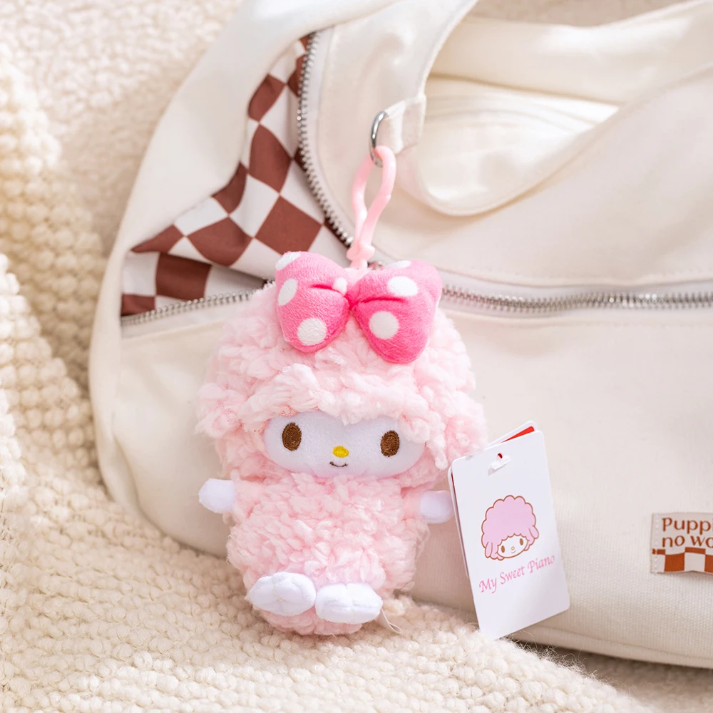 Sanrio Piano oveja rosa colgante de felpa monedero Kawaii niñas bolso encantador teléfono coche llaveros de felpa Piano ovejas llaveros rellenos