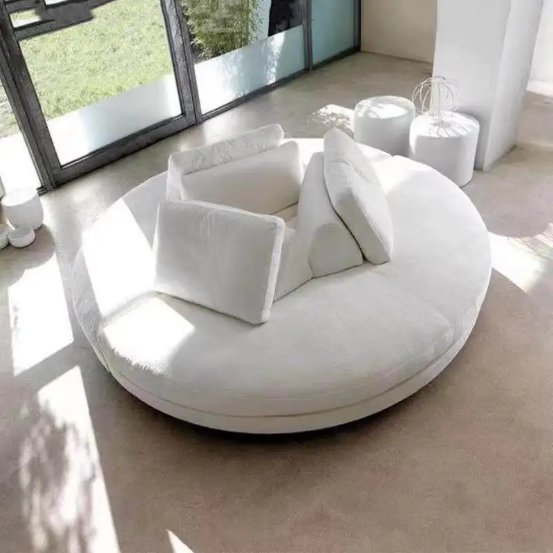 Simple hotel clubhouse lobby lounge area with casual multi-seater sofas