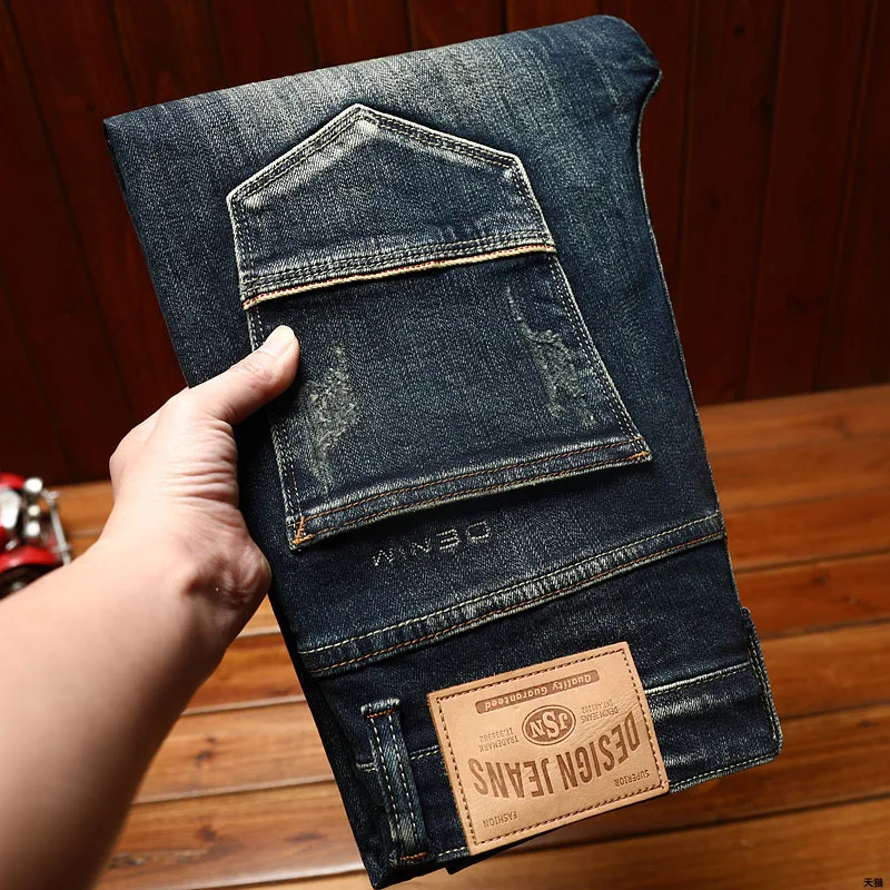 Jeans biru Retro pria, celana pintar Semua cocok dengan pensil tercuci, pakaian elastis Fashion klasik musim semi 2024