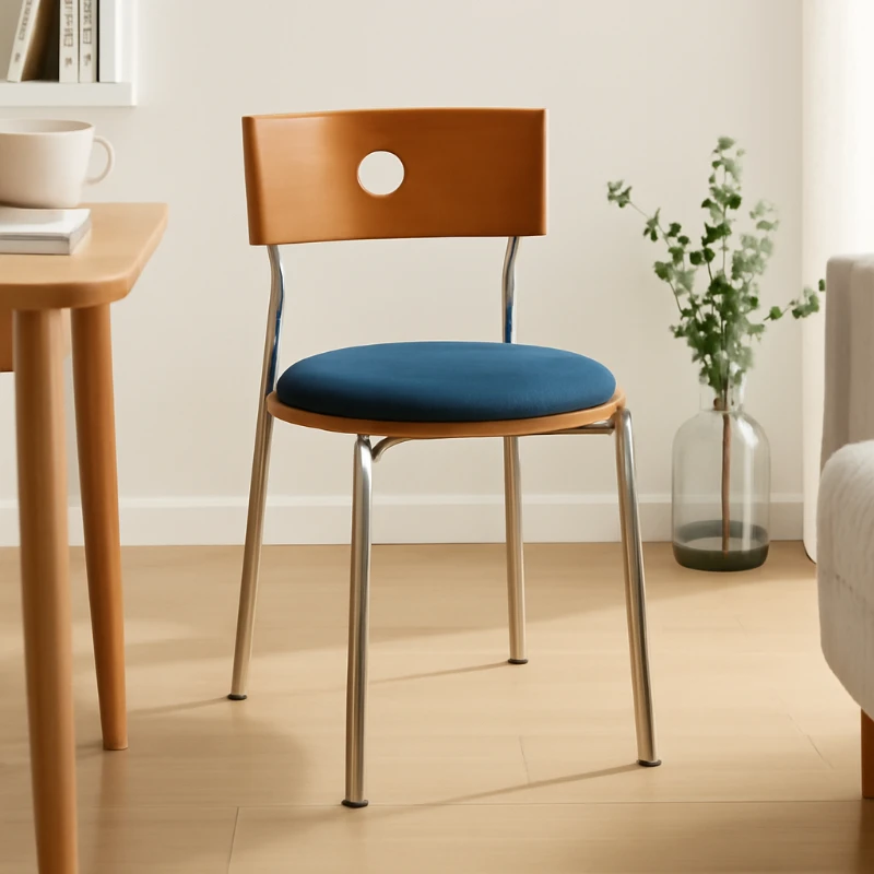 

‌Vintage Danish Designer Chair - Mid-Century Modern Stainless Steel Backrest, Retro Patio & Cafe Seating with Gold Plated Legs