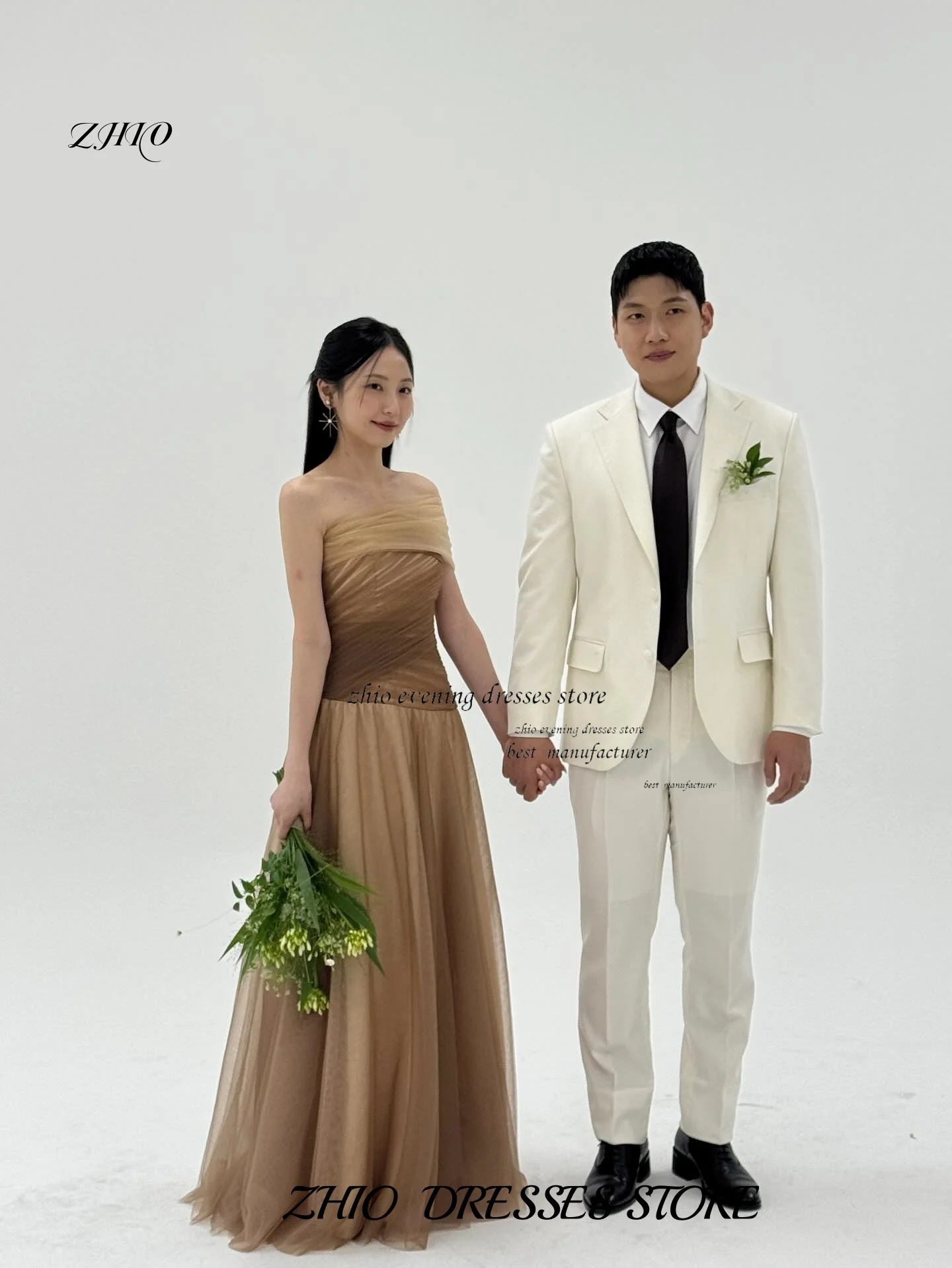 فستان ZHIO مزرف باللون الشامبانيا من التول فساتين كورية بدون حمالات بدون أكمام فساتين مخصصة بطول الأرض فساتين رسمية ستناء