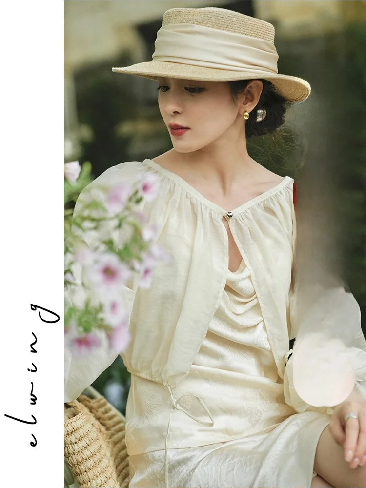 

Оригинальная китайская женская летняя тонкая блузка Elwing с длинными рукавами-фонариками из полиэстера для кондиционированных помещений