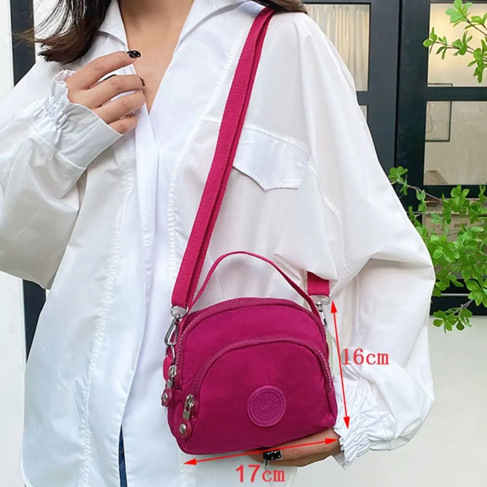 Bolso cruzado informal de nailon para mujer, Mini bolso de hombro de gran capacidad de Color sólido, bolso de teléfono de viaje con cremallera multicapa