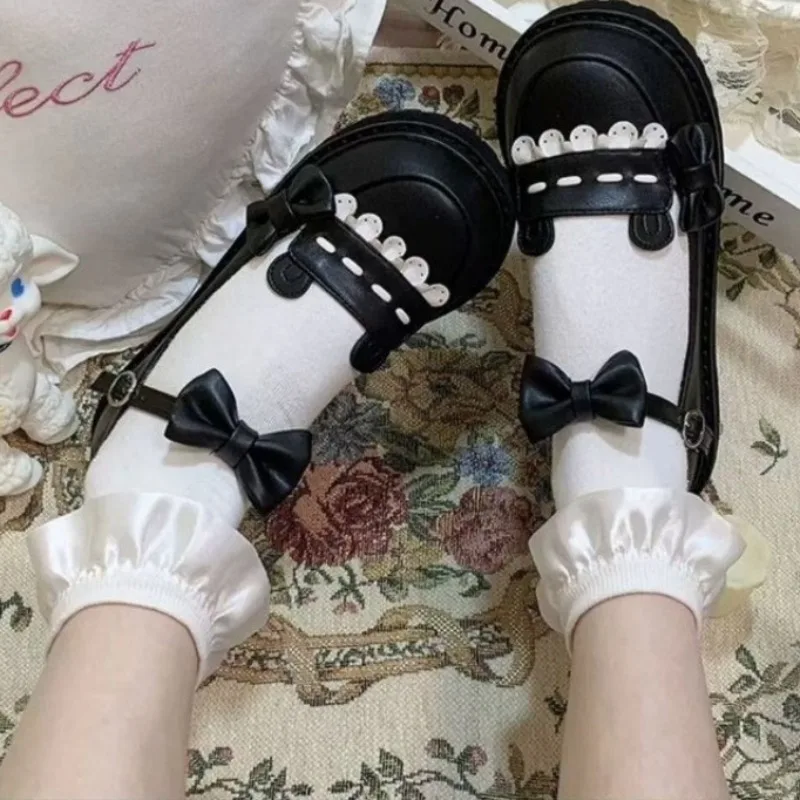 أحذية نسائية مسطحة ربيعية جديدة برأس مستدير وفم ضحل وعقدة على شكل فراشة ونعل سميك أحذية مانعة للانزلاق