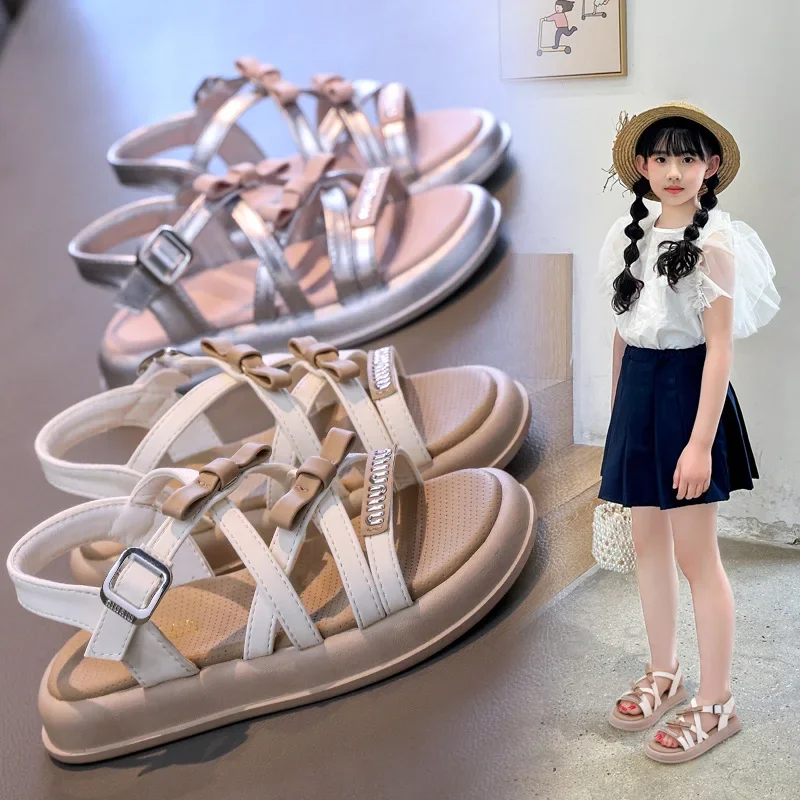 

Детские сандалии, модная обувь принцессы с бантом для девочек, новинка 2023 года, летняя повседневная детская пляжная обувь в римском стиле с мягкой подошвой