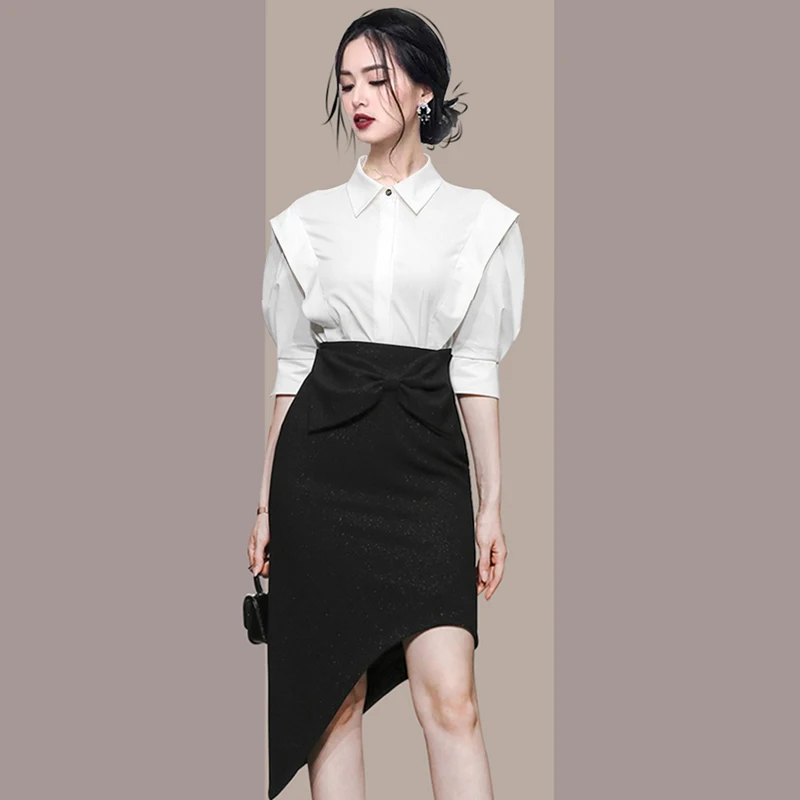 

Профессиональный летний женский комплект из двух предметов: приталенное асимметричное платье с коротким рукавом и модная рабочая одежда