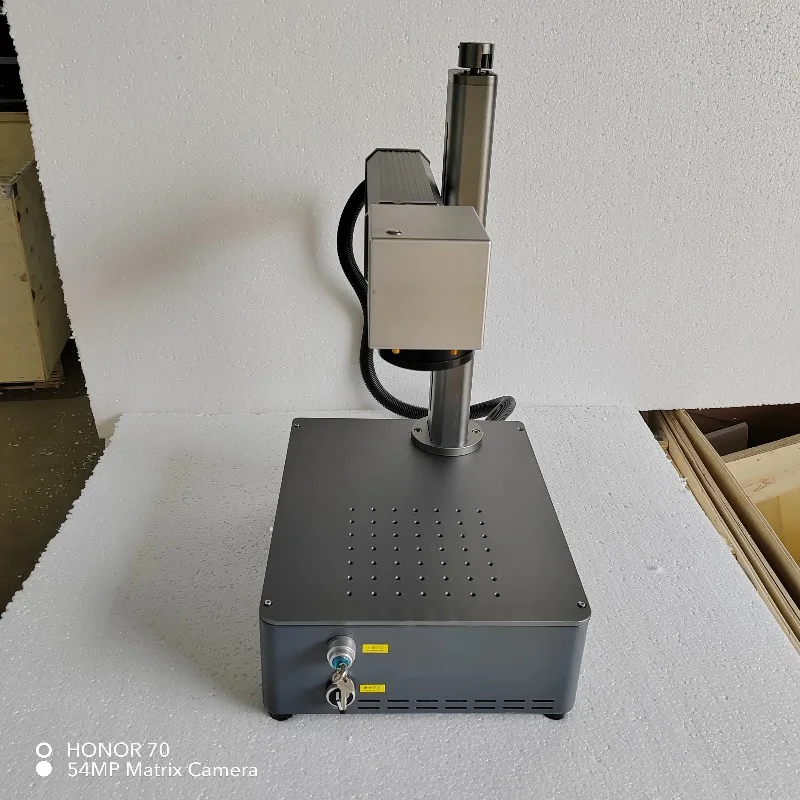 

Raycus 20W or 30W mini fiber laser marking machine with 7110 glavo head have a good price to door