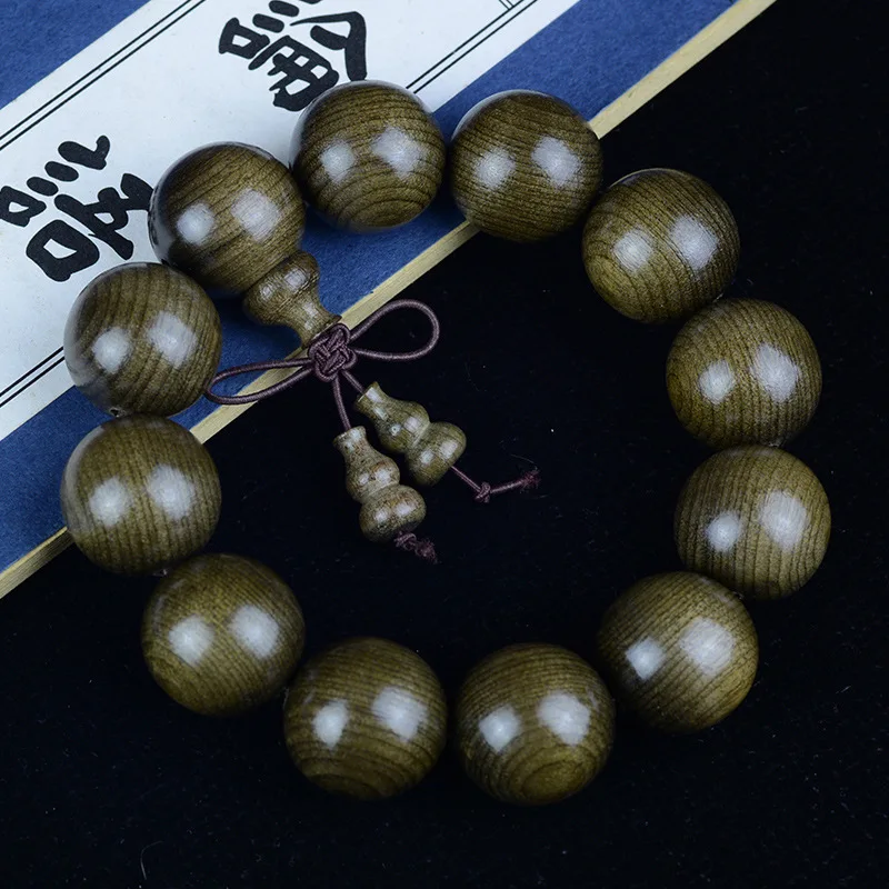 

Sichuan Silk Nanmu Ebony Old Material Bracelet Wooden Cultural Play Ornament Bracelet Silk Nanmu Bracelet Wholesale