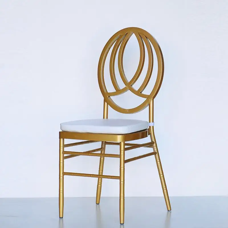 

Elegant modern metal chair with seat cushions, family and wedding party hotel dinner available