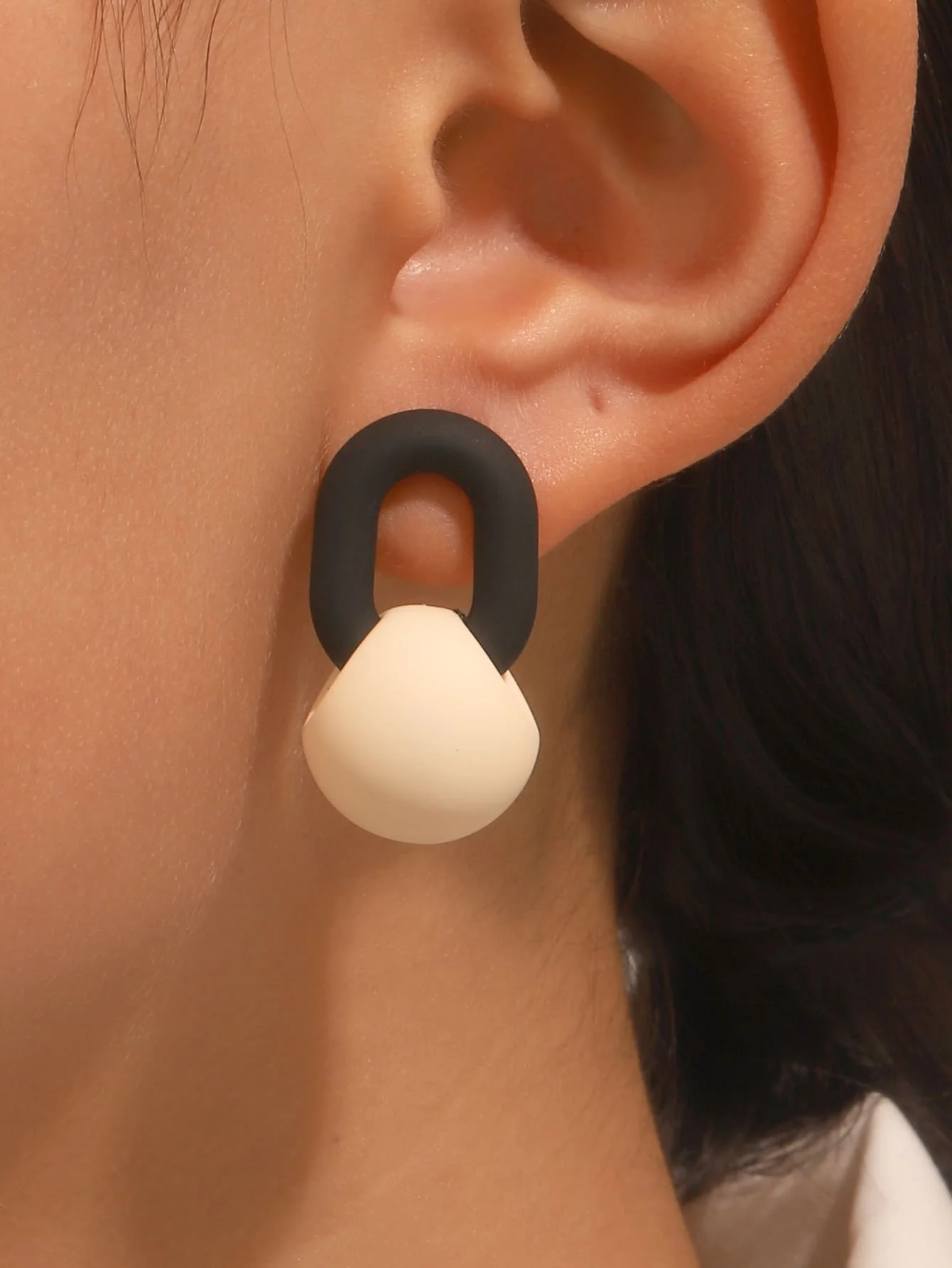 

Two-Tone Geometric Drop Earrings in Matte Black and Cream Resin