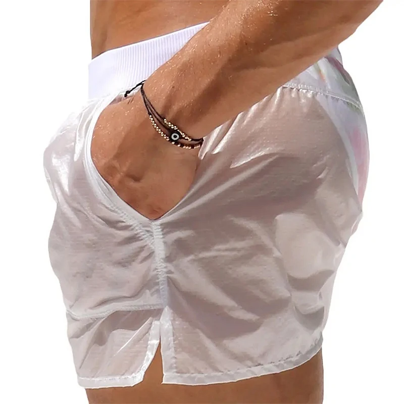 2025 pantalones cortos de moda para hombre, bañadores para hombre, cintura elástica, pantalones cortos transparentes para playa de verano, traje de baño con bolsillos