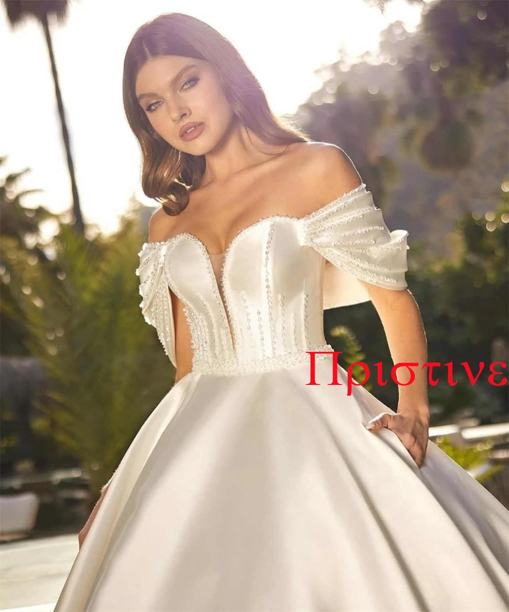 Vestido de novia elegante blanco personalizado con escote en forma de corazón de cristal, vestidos de novia con botones en la espalda y hombros descubiertos para fiesta nupcial