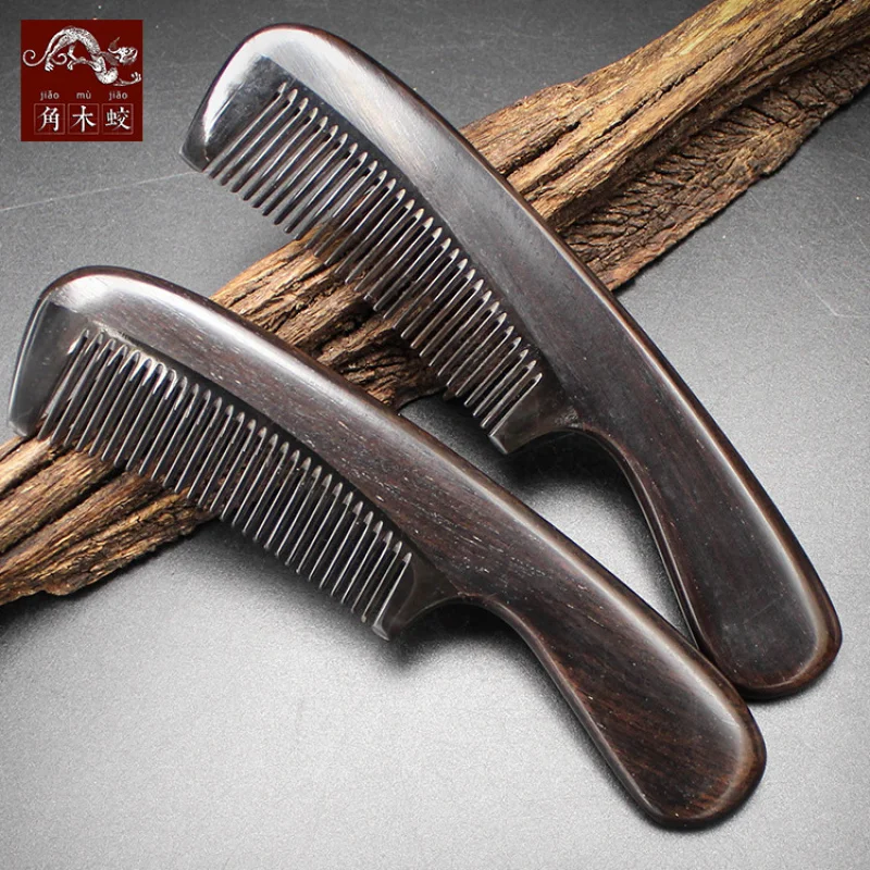 made of hornwood, ebony, and black sandalwood combined with buffalo horn, children's , small comb, new design