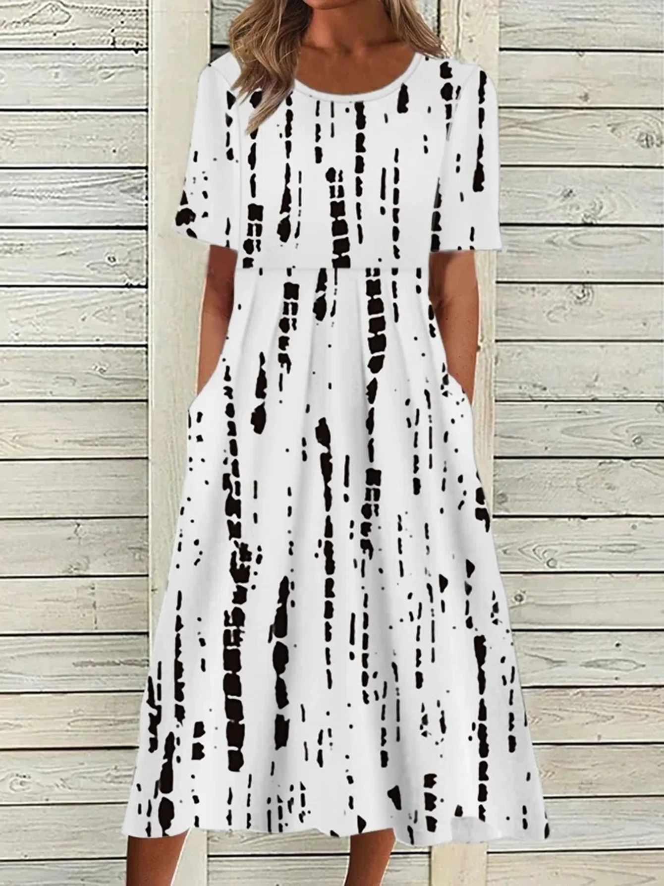 2026 Sommer Damen Freizeitkleid mit Rundhalsausschnitt, gepolstert, kurzärmelig, bedruckt – Detail 11